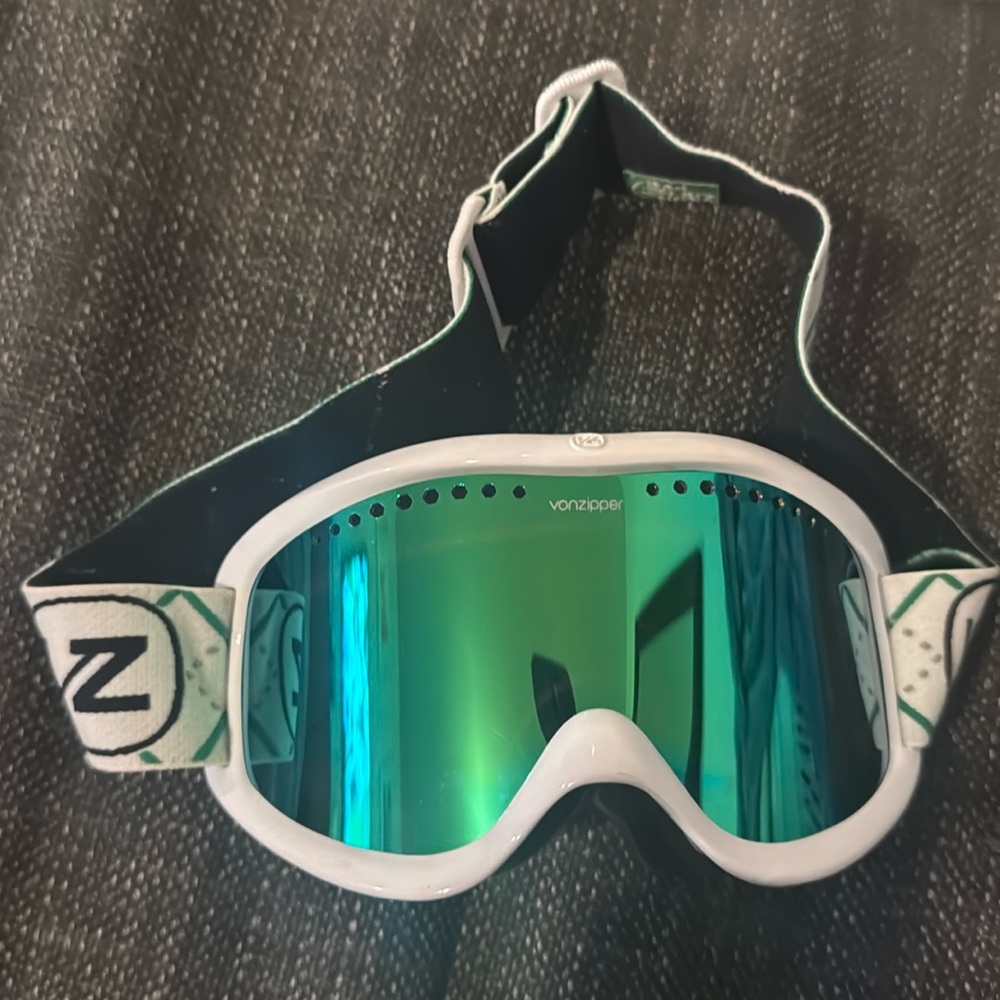 Green lens ski goggles